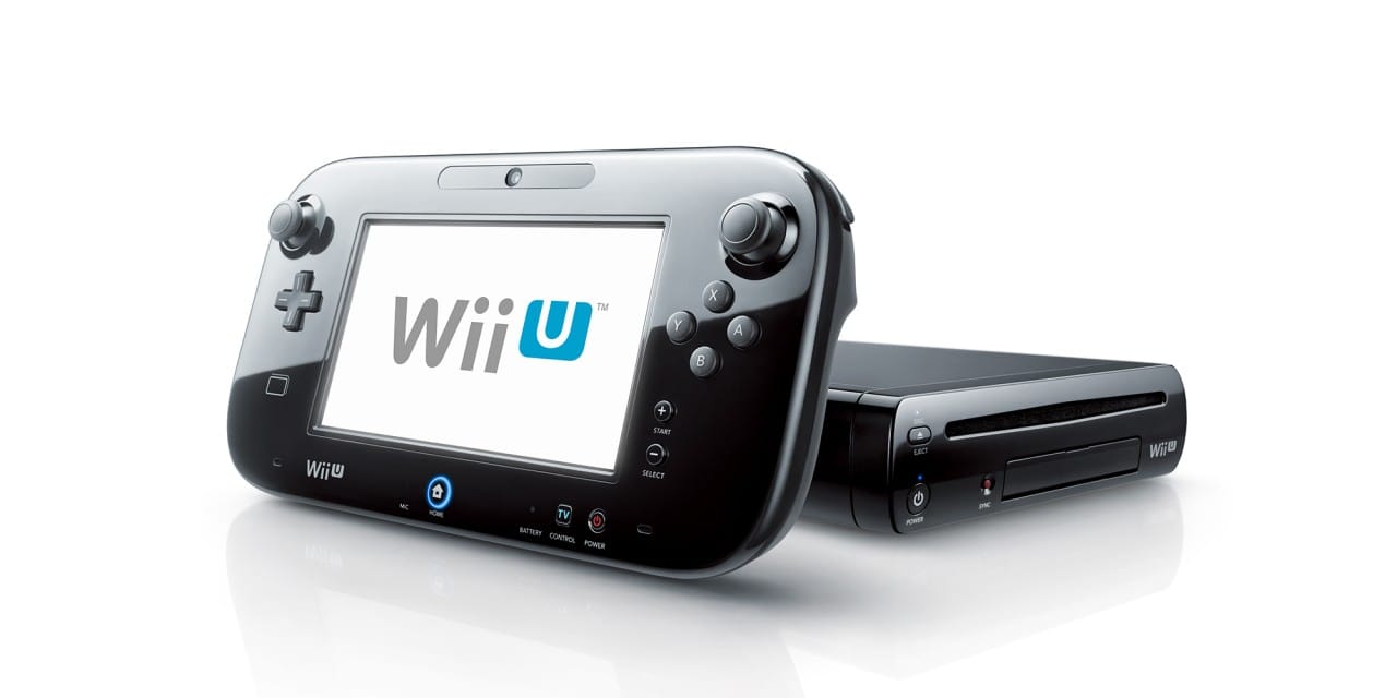 Product image of a black Wii U with a GamePad lying against it.